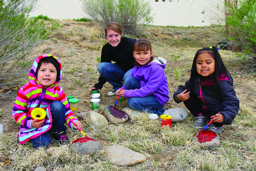 three small students with instructor in the CFDC program at SJC