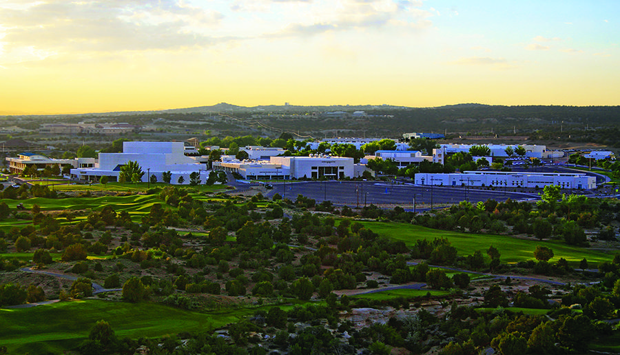 full campus shot with the sun rising in the East